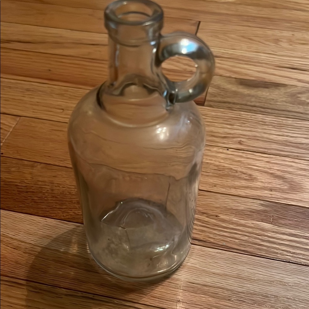 Vintage glass syrup jug with handle